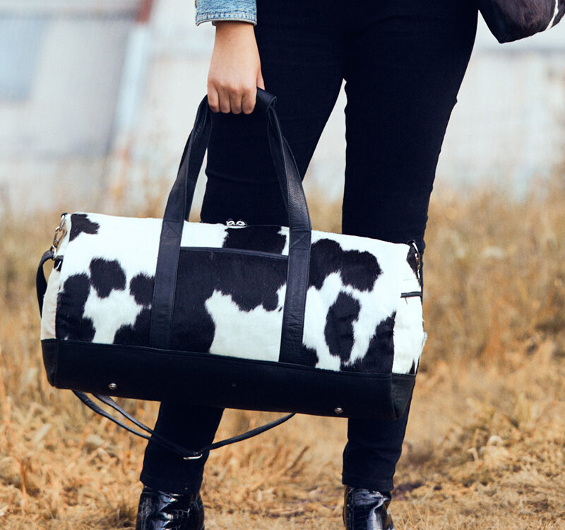 Tole – Black and White Cowhide Phone Bag with Tooling - Cowhide Bags  Australia